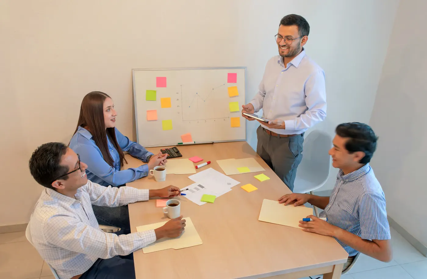 Team working collaboratively during an office workflow review